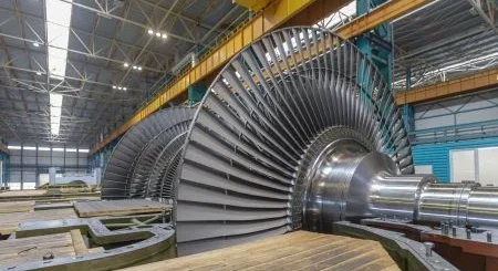 Close-up view of steam turbine rotor blades in power generation facility