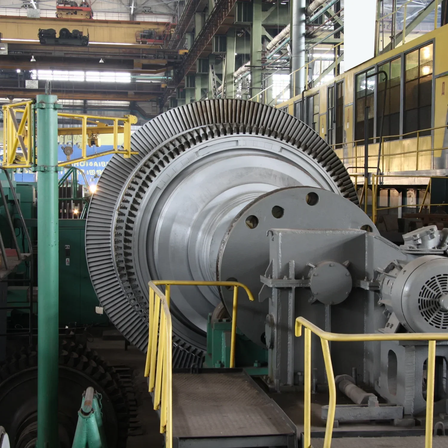 Large water turbine parts during production at heavy industrial manufacturing facility